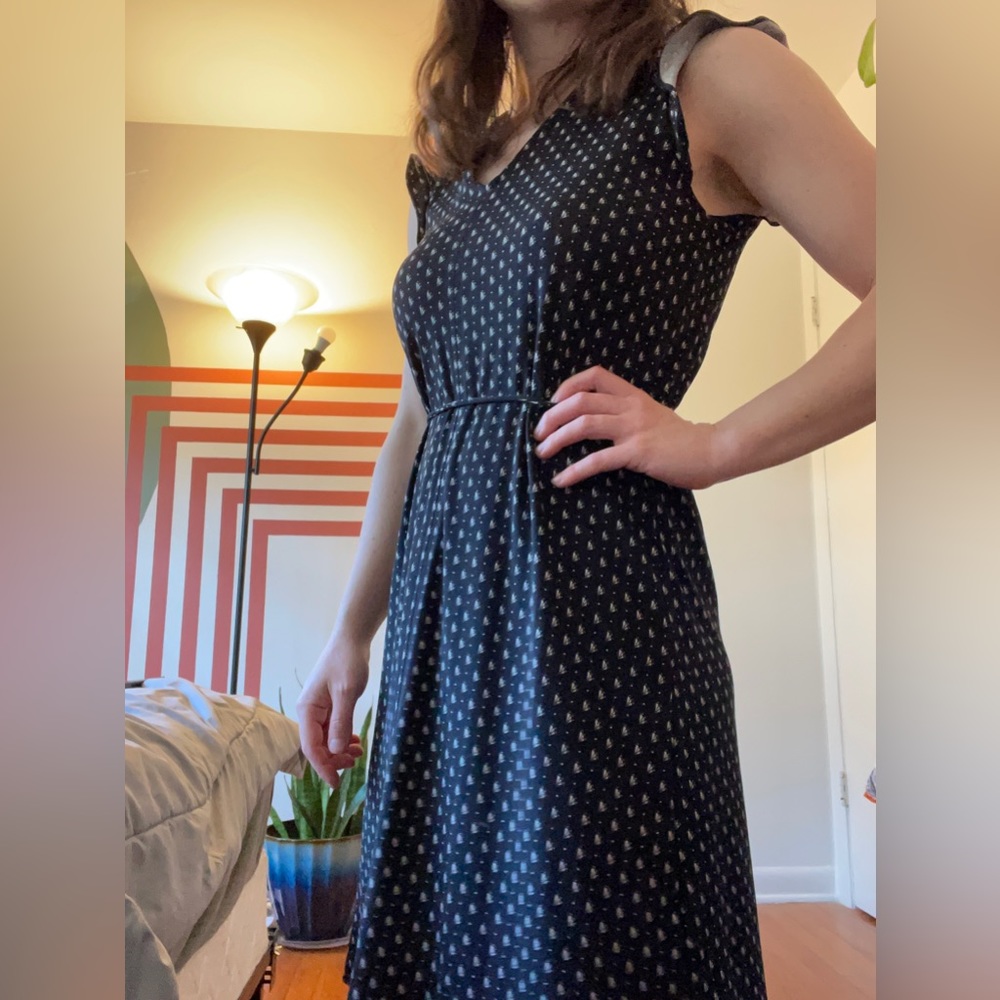 Black patterned, v neck dress. Perfect for business attire or dress up or down